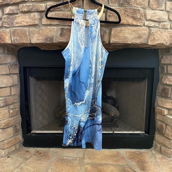 Dresses & Skirts - Gorgeous blue and gold racer back sundress with gold collar.